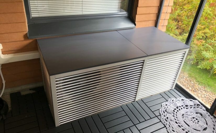 Cover and storage solution for air conditioning unit